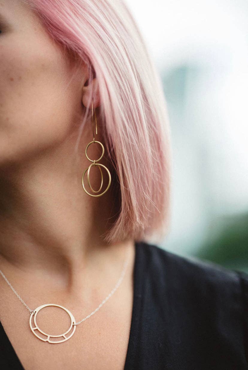 Kinetic brass hoop within hoop hoop earrings