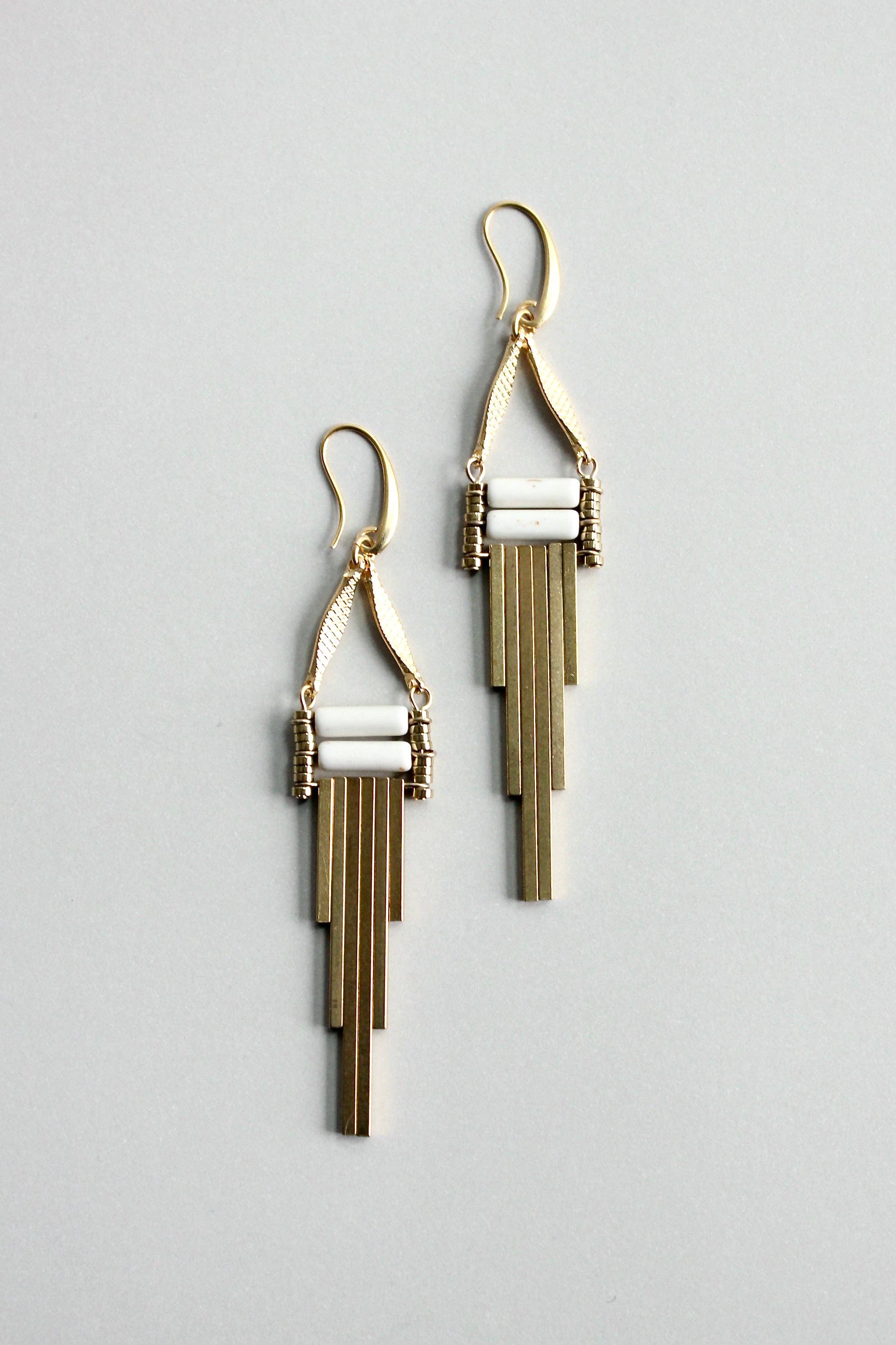 Modern white and brass earrings, photo 1 of 3