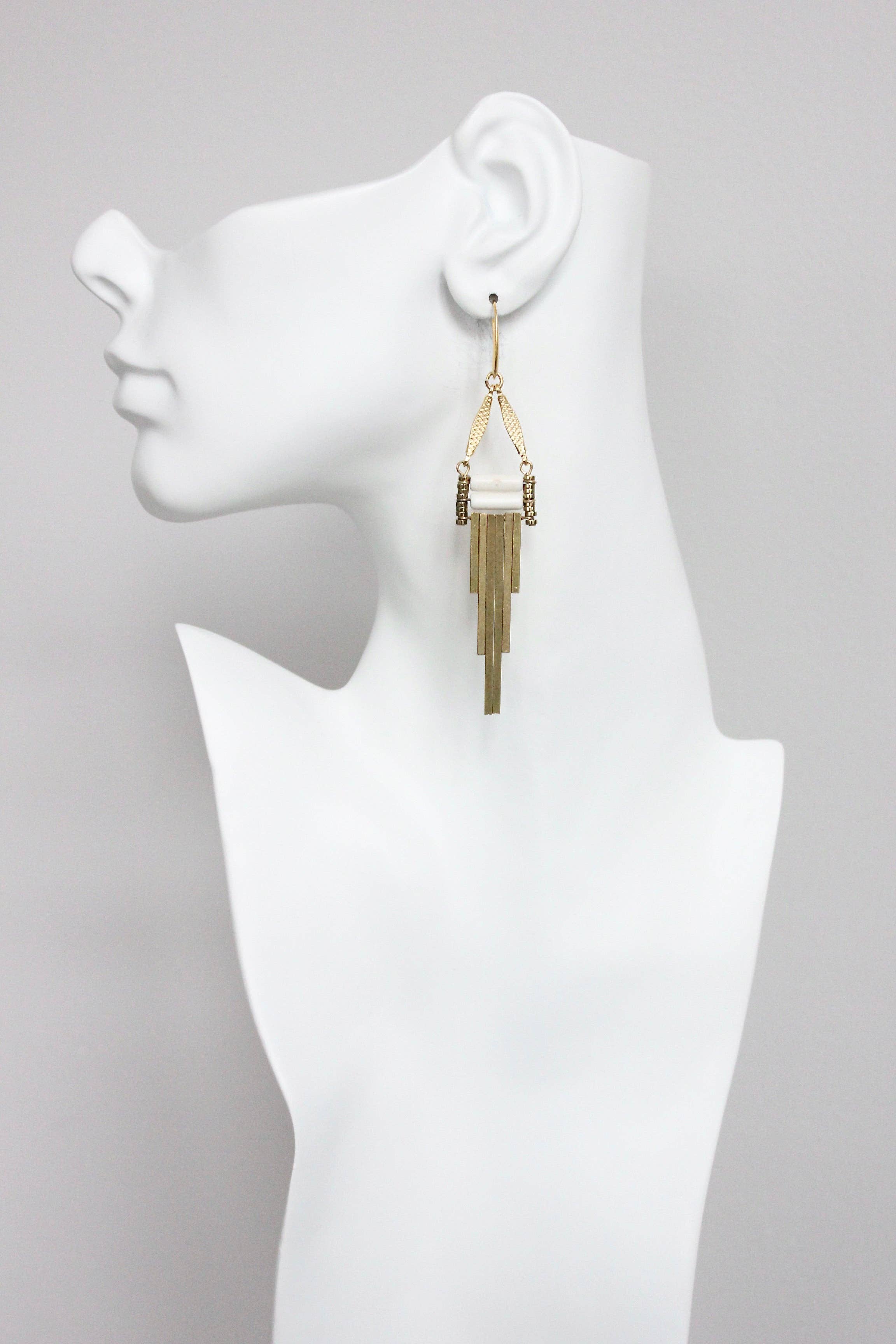 Modern white and brass earrings, photo 2 of 3
